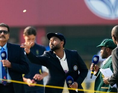 India’s new Test captain standing on the cricket field
