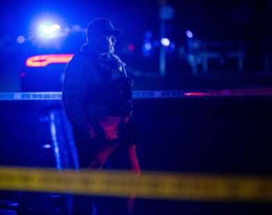Police and emergency vehicles at the scene after a shooting at a children's birthday party in California