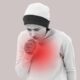 A girl coughing due to dry cough, illustrating the need for natural home remedies for quick relief