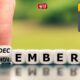 A girl’s finger changing the November block to December in a puzzle-style calendar, symbolizing upcoming rule changes