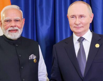 Vladimir Putin shaking hands with Indian Prime Minister Narendra Modi during an official meeting