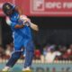 Rohit Sharma celebrating after hitting a six, marking his world record for the most sixes in ODI cricket
