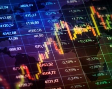 Stock market display showing a sharp decline as shares of five companies drop up to 56% in November.