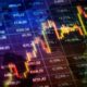 Stock market display showing a sharp decline as shares of five companies drop up to 56% in November.
