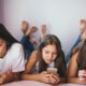 Illustration showing a smartphone with a “No Social Media under 16” sign, representing Australia’s ban on social media for children below 16 years