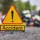 Scene of a serious road accident on the Dhule–Solapur Highway showing damaged vehicles, with reports of one person dead and another critically injured