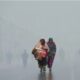 Kashmir mountains covered in snow with dense fog affecting roads and railways in North India