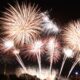 Family celebrating New Year 2026 at home with decorations and lights