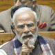 He is criticizing Congress on the issue of Vande Mataram