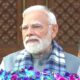 Prime Minister Narendra Modi arriving at the Indian Parliament during the winter session, greeting members and media