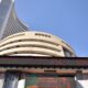 Stock market display board showing declining indices as Sensex drops 65 points and Nifty falls 27 points at closing