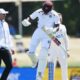 West Indies cricketer Justin Greaves celebrating his record double century in the fourth innings of a Test match