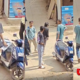 Schoolchildren creating a ruckus with sickles in their hands